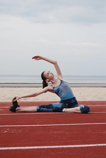 participant practicing stretching routine in an educational setting